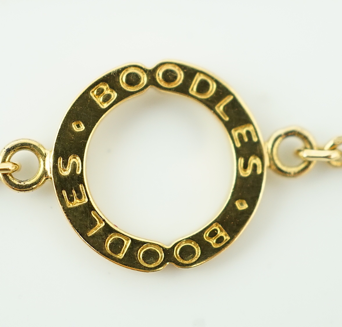 A modern Boodles 18ct gold fancy vivid yellow diamond cluster set pendant necklace on a two stone diamond set chain, with clasp and Boodles ring set with small brilliants